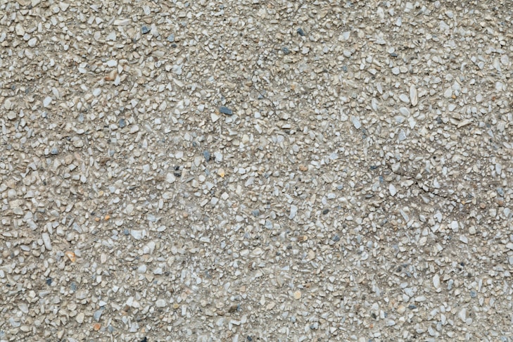 Close-up of a coarse refractory aggregate with pale chips