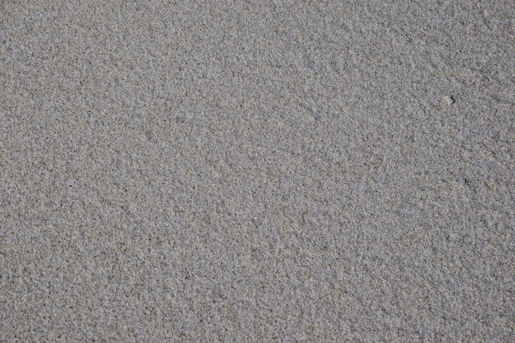Close-up of a fine-grained grey refractory surface